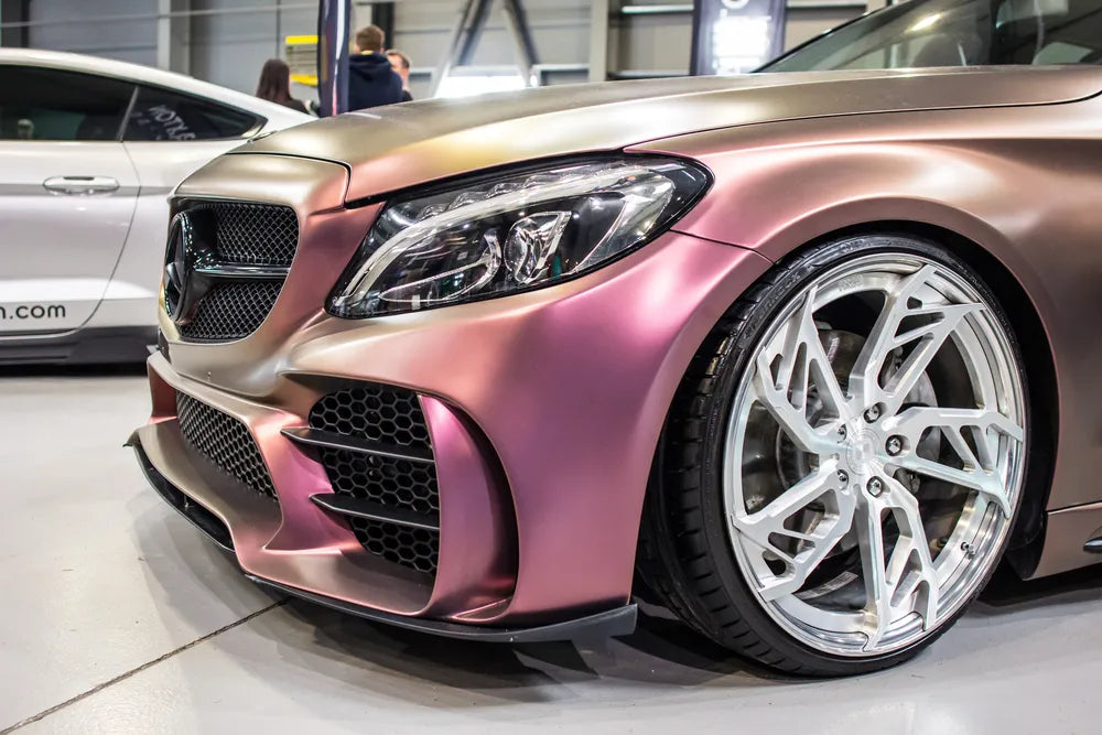 View of front side Mercedes with pink chameleon car paint