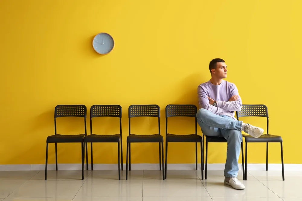 Guy waiting for his car paint coat